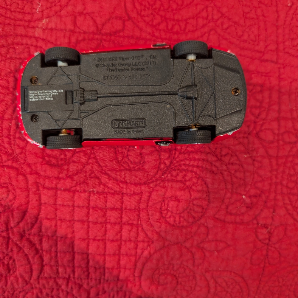 Red Die-Cast Model Car
